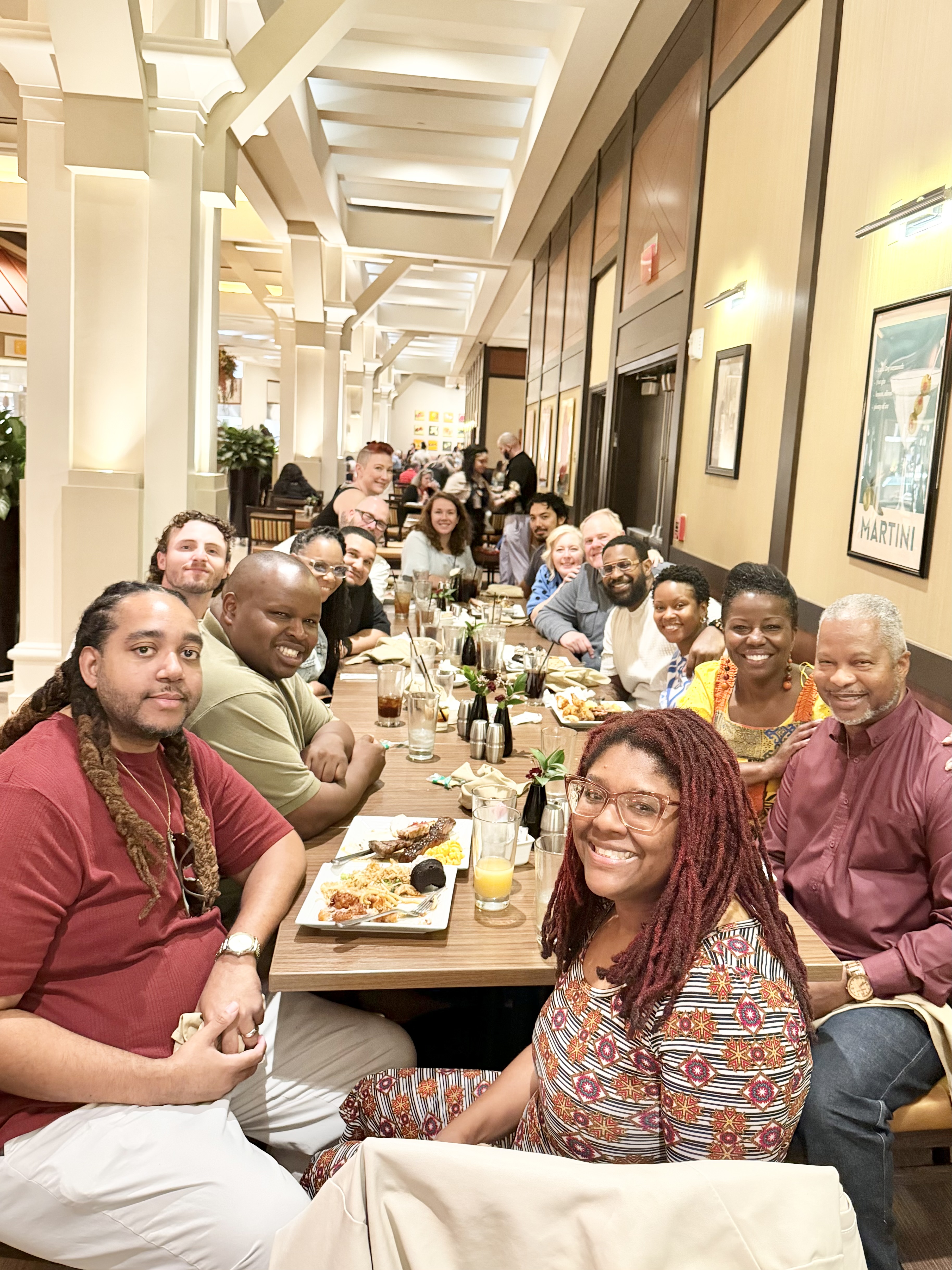 Christ Fellowship Tampa staff gathered together around a long table
