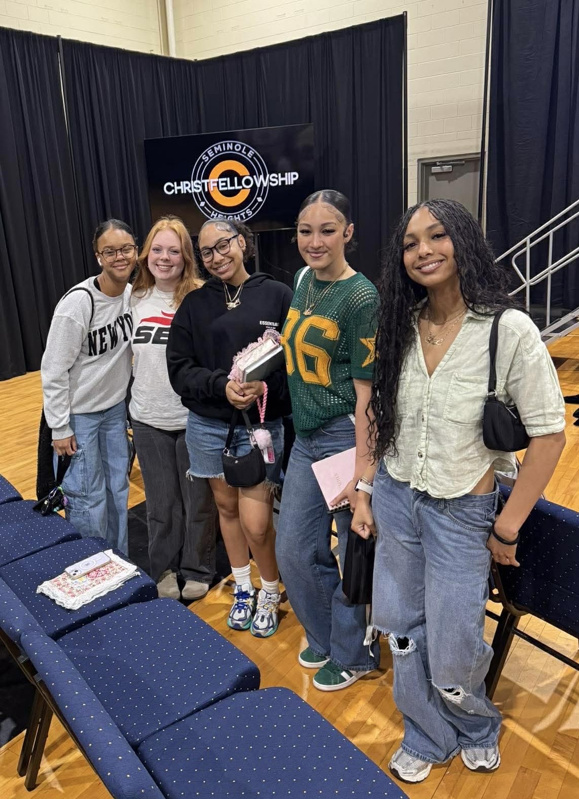 Five Christ Fellowship college students and young adults together after a church gathering