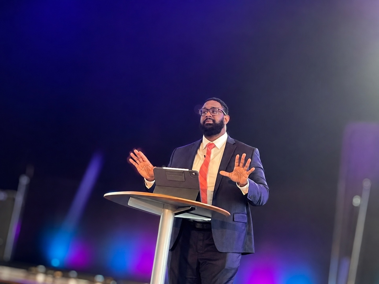 Pastor Zach Carroll teaching Scripture during a Christ Fellowship Tampa worship gathering