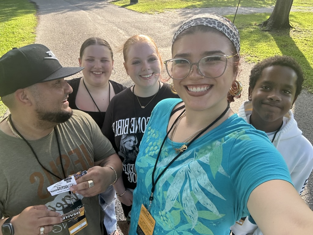 Christ Fellowship students and adult leaders serving people together